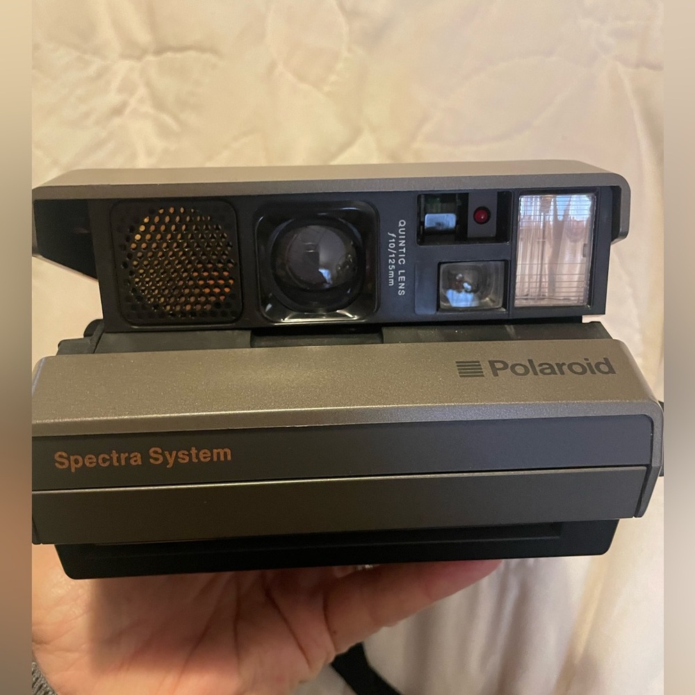 Polaroid Spectra System Camera with original carrying strap.